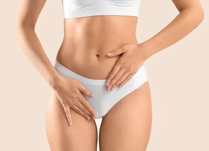 Young woman on light background, closeup