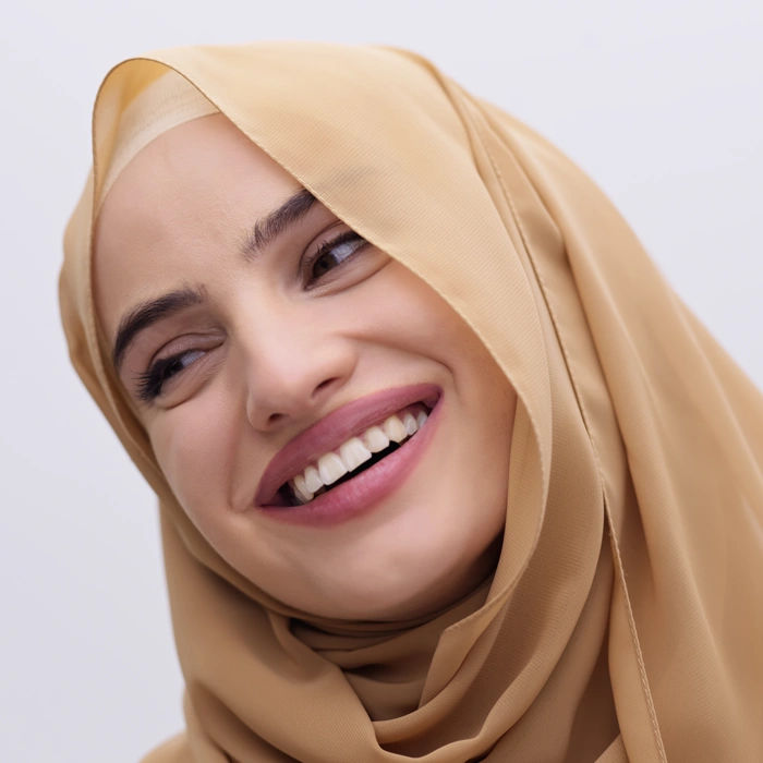 Portrait of young muslim woman wearing hijab