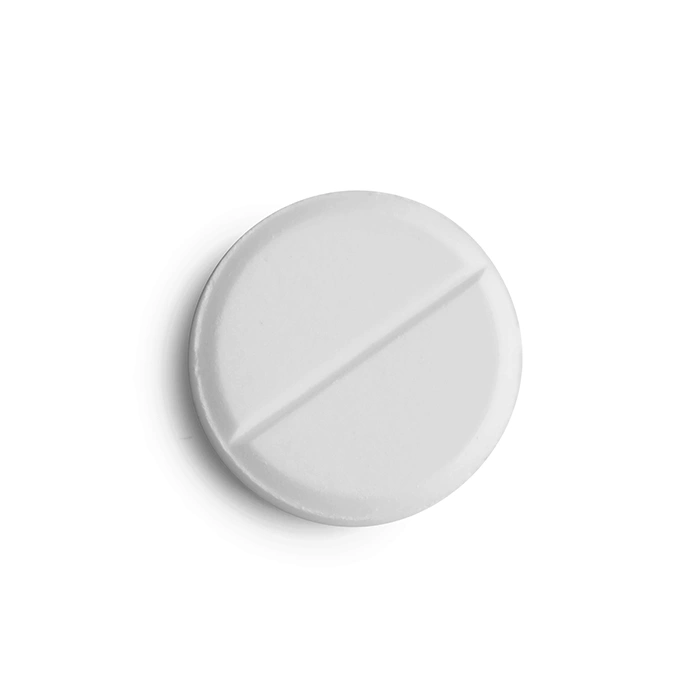 One pill isolated on white, top view